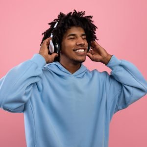 attractive-black-teen-guy-in-casual-wear-listening-2022-01-30-08-42-49-utc.jpg